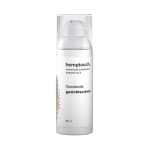 een close up van een Voedende gezichtscrème met CBD van Hemptouch (50 ml) op een witte achtergrond.